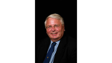 Peter Holmes, Sheffield alumnus and staff, smiling at the camera.