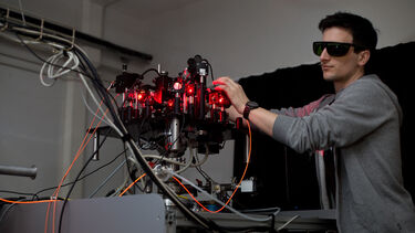 Physics student using equipment in the 2D materials laboratory