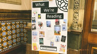 A poster display, which says: what we're reading