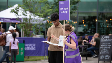 Ambassador with prospective student at an open day