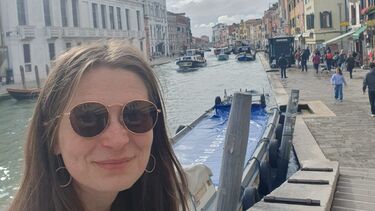 YOung woman with sub glasses called Megan on a canal in Venice