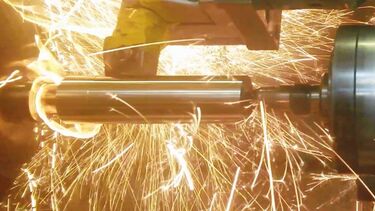 Bright yellow sparks created by machining