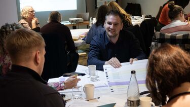 Dr Vladislav Grosev engages with attendees during interactive activity 