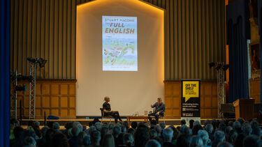 In conversation with event in Firth Hall, backs of people head