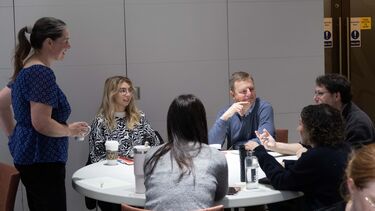 Laura Dean engages with attendees during interactive activity 