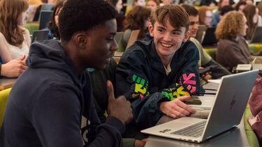 Students in discussion during lecture
