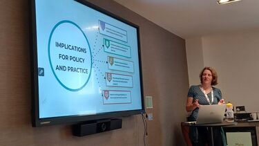 This is an image of Fiona Sampson presenting the pre-alerts project