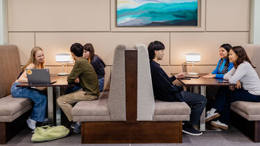 Students sitting in the Ridge