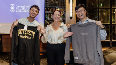 Sheffield alumni raffle winners at the Singapore alumni event.
