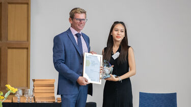 Truc Linh Ta receiving her Dean's List award.