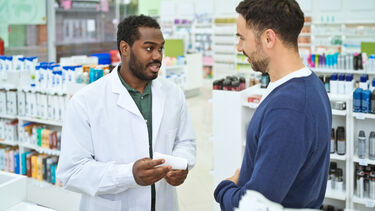 Pharmacist talking to a patient