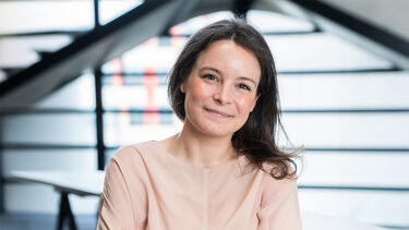 Head shot of Alice Pyne (young white woman with dark hair)