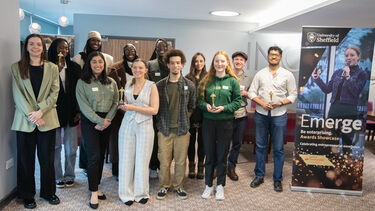 Group of students winning prizes 