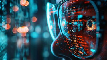 A person looking at code through high tech goggles.