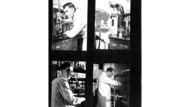Black and white photos of classmates in the labs at Sheffield, taken by Bill Walsh
