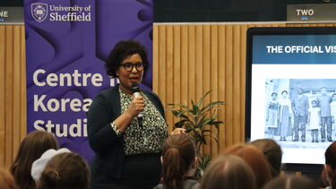 photograph of Monica Macias speaking