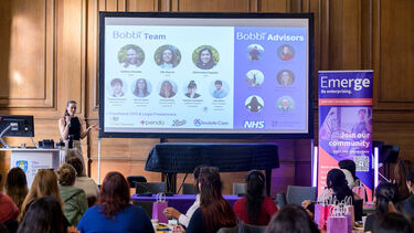 Women presenting to full room