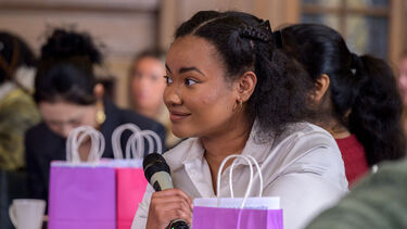 Women holding microphone