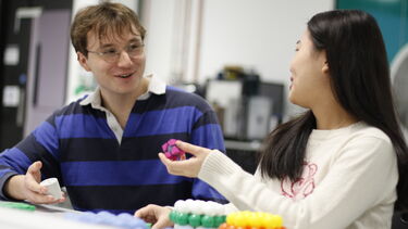 Material Science and Engineering Students with Molecular Models