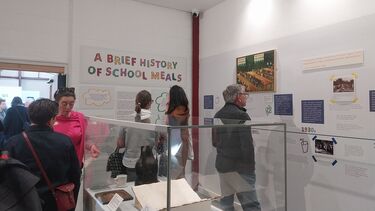 Visitors walking around the School Dinners Exhibition
