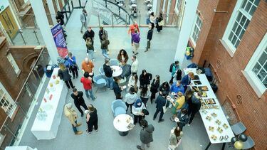 Height shot of drinks reception in large indoor space