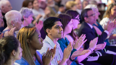 Clapping audience members at the Alumni Volunteer Thank You event 2025