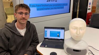 Adam Jones presents his project in computer room 5