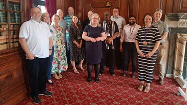 Group of board members in Firth Hall 