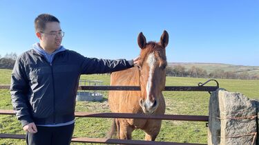 Zhipeng with a horse