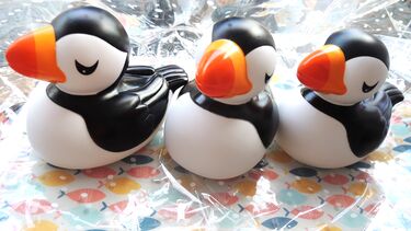 Three rubber puffins