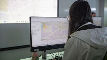 student working with mapping software