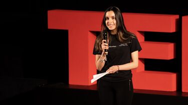 Maria speaking at the TEDx event.