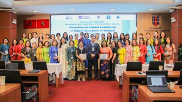 Mentees of the event assembled at the front of the class