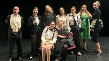 Play cast gathered for dress rehersal