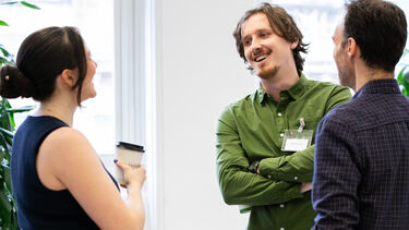 Three people networking