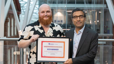 Lewis Blackburn with his award