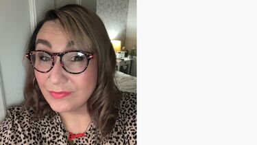 danica smiling at the camera