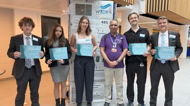 Winning student team with certificates