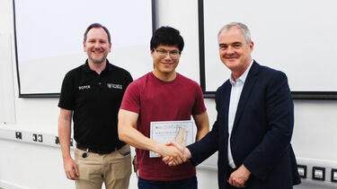 Student being awarded a certificate 