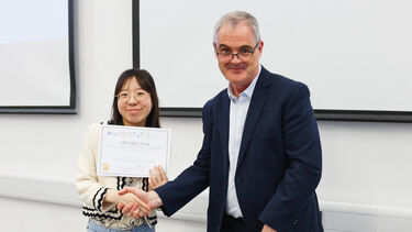 Student being awarded a certificate
