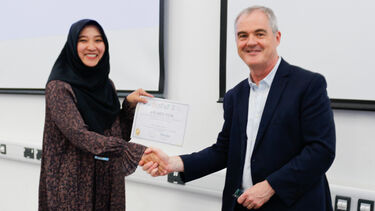 Student being awarded a certificate