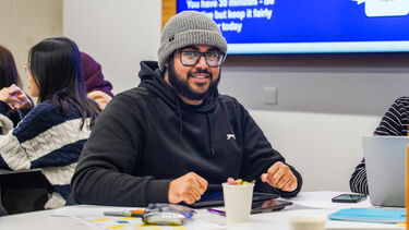 Student smiling at camera