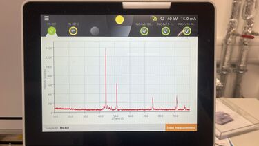Chart on a small digital screen displaying readings from the SQUID