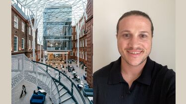 An MBA student next to a University building.