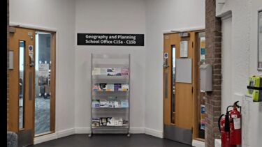 Geography and Planning Building defibrillator outside the school office