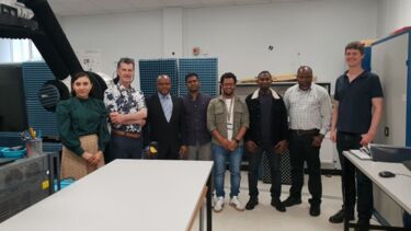 The team with the visitor from Manchester Metropolitan University