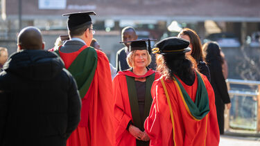 PG research students on concourse at Graduation