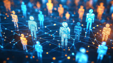 Computer symbols of people are connected in a network.