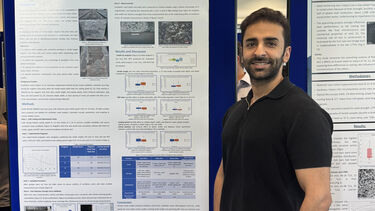 MMet Advanced Metallurgy student in front of his poster presentation