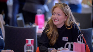 Women smiling on table